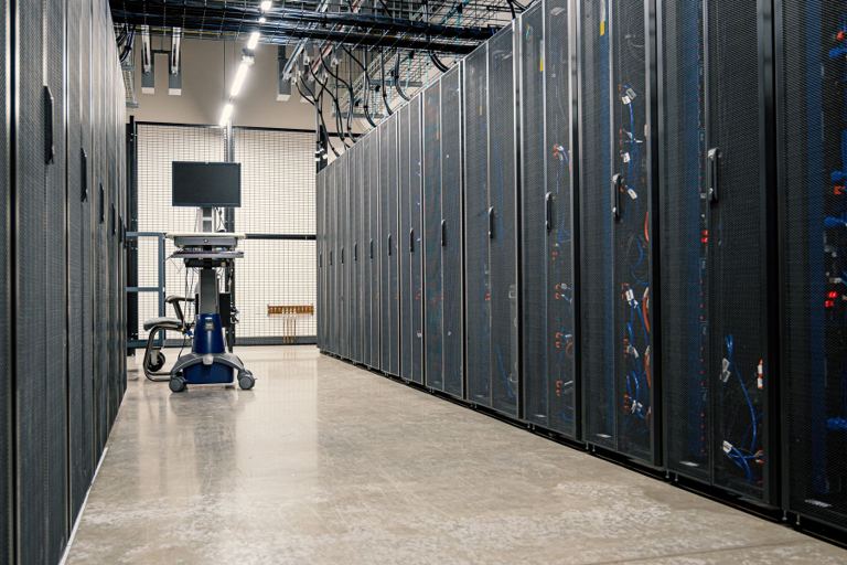 Rows of server racks inside a data centre